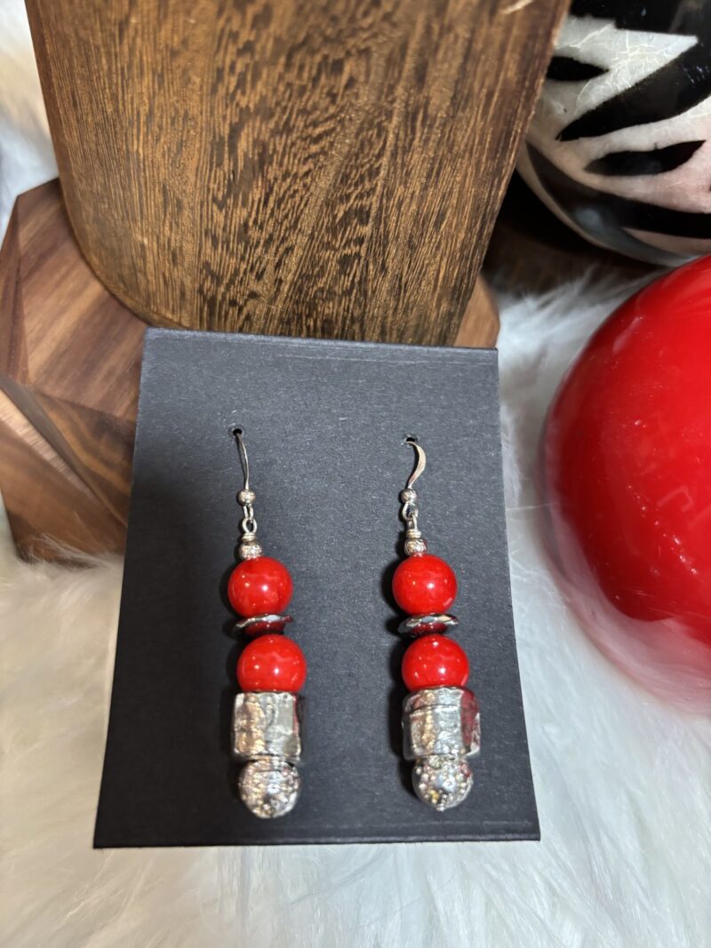 Style E14 – red howlite rounds, black spacer, Tibetan-silver tube bead, silver hooks