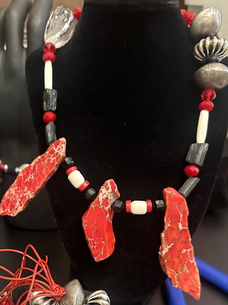 Style N11 – Red impression-jasper slab drops, clear quartz nuggets, carved bone pipe beads, black lava tubes